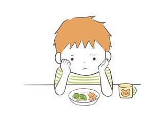 嫌いな野菜を見て食べようか悩む子ども
