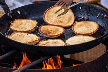 Blini, blin or blynai, pancakes traditionally made from wheat or buckwheat flour and served with...