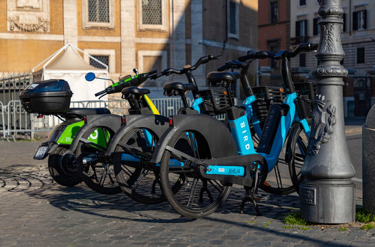 Rome, Italy - March 4, 2022: A picture of a group of electric bicycles of the brand Bird.