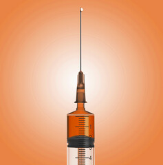 syringe with drop and orange liquid