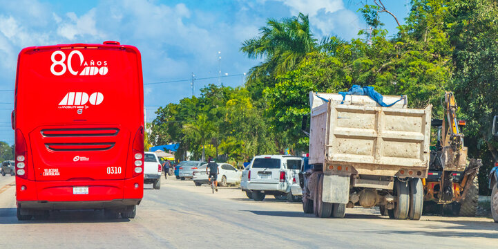 Trucks dump truck and other industrial vehicles in Tulum Mexico.