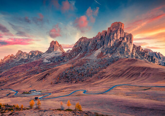 Exciting autumn view from the top of Giau pass with famous Ra Gusela peak on background. Amazing...