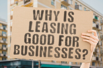 The question " Why is leasing good for businesses? " on a banner in men's hands with blurred background. Buy. Rental. Vehicle. Credit. Investment. Mortgage. Transport. Insurance. Form. Key. Job. Bank