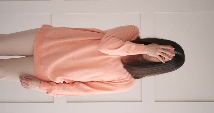 Vertical video of disappointed woman regretting her deeds