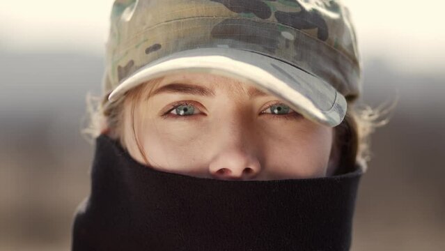 Close-up of a professional fully equipped soldier looking at camera. Ukrainian soldier
