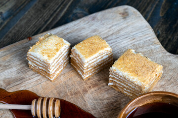 cake made of thin honey cakes and a thin creamy layer