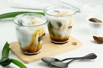 Es Cincau Hijau or Green Grass Jelly (Cincau Ijo), Indonesian Dessert Made from Cincau Leaf with Coconut Milk and Palm Sugar.