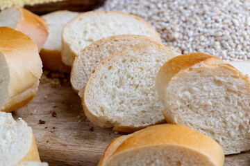 pieces of wheat baguette on a cutting board