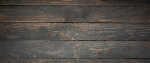 Naklejka premium Dark Wooden Black Stained Board Background Empty Space