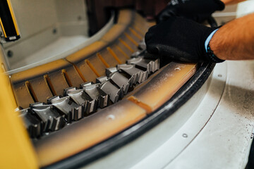 Airplane engine factory. The process of sandblasting parts for airplane engines. Industrial concept.