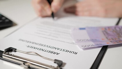 employee retirement agreement in German-speaking language. An HR employee sends an employee into retirement. Staff reduction. Resignation.