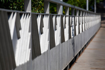 handrails painted metal fencing parts of the bridge