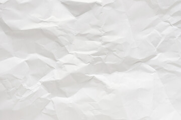 White crumpled paper texture background.