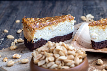 creamy chocolate cake with caramel and roasted peanuts