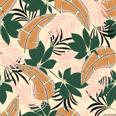 Abstract seamless tropical pattern with bright plants and leaves on a beige background. Hawaiian style. Tropic leaves in bright colors. Beautiful seamless vector floral pattern.