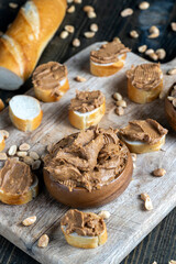 nut food on a cutting wooden board in the kitchen