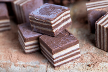 multi-layered sweets made of cream and chocolate layers