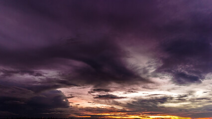 Dramatic sunset in the Sky through cumulus storm clouds, Timelapse. Awesome epic landscape. Amazing vibrant colors, in Goiania, Brazil