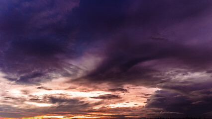 Dramatic sunset in the Sky through cumulus storm clouds, Timelapse. Awesome epic landscape. Amazing vibrant colors, in Goiania, Brazil