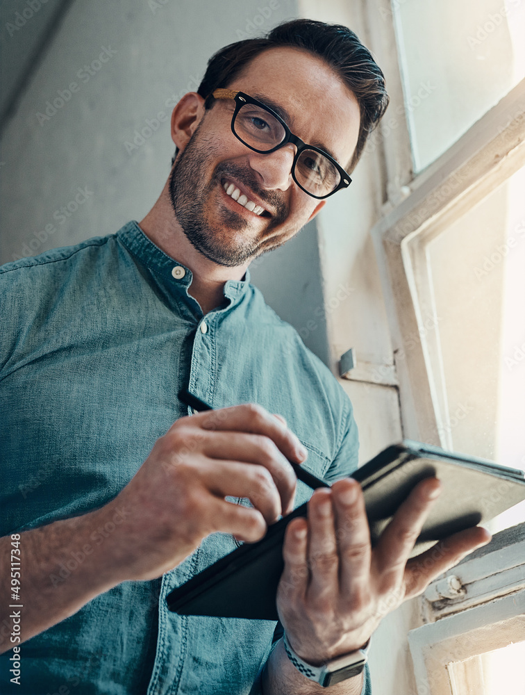 Poster it takes determination most of the time. cropped portrait of a handsome young businessman smiling wh