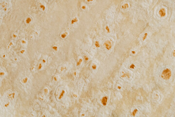 Texture of thin traditional freshly baked homemade oriental bread