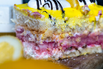 lemon strawberry cake made of several layers of cakes of different flavors