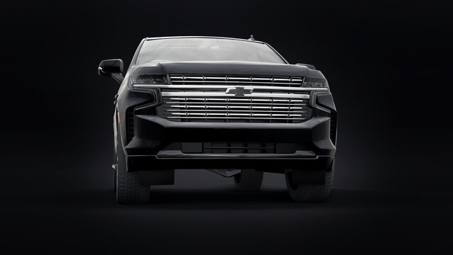 Paris, France. November 4, 2021: Chevrolet Tahoe black luxury car isolated on black background. 3d illustration.