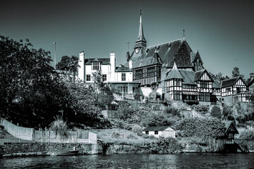 View of the banks of the River Dee in Chester, taken from the River Dee itself - presented in...
