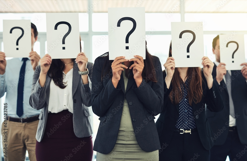 Poster Do you have answers because we have questions. Shot of a group of businesspeople holding questions marks in front of their faces.