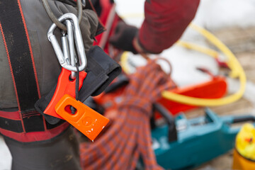 Climbing equipment. Cable car access. Winter, frost, difficult work