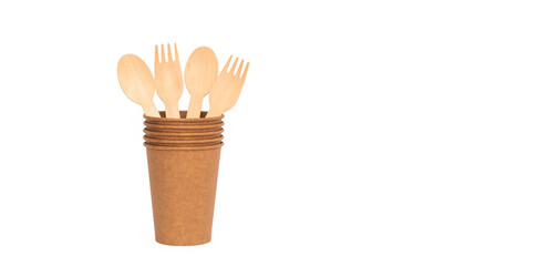 Eco brown cup and wooden fork, spoon on a white background. Mockup for your and copy space