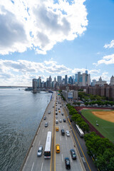 FDR Drive runs toward Lower Manhattan skyscraper beside the East River on August 02, 2021 in New York City NY USA.