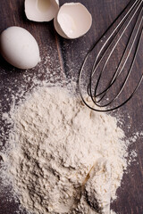 preparing for dough with eggs and flour.