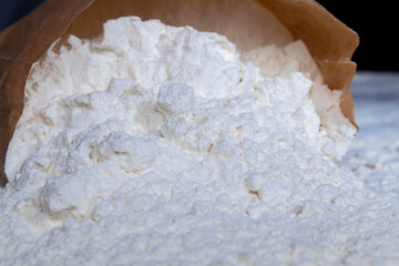 wheat flour from wheat grains on the table