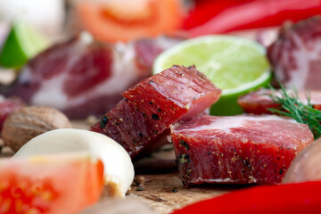 pork and bacon sliced during cooking