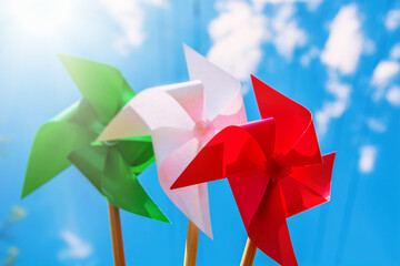 paper windmill in italian flag color, national Italy background	
