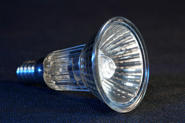 Lightbulb, halogen, incandescent lamp are reserve lamps for motor vehicles in 12 volt operation photographed in the studio