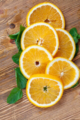 Fototapeta na wymiar sliced ripe orange on a board