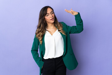 Young caucasian woman isolated on purple background with tired and sick expression