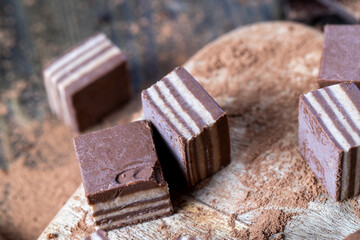 multi-layered sweets made of cream and chocolate layers