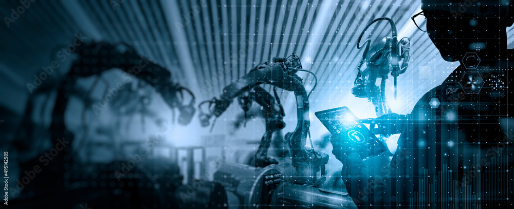 Poster Factory Female Industrial Engineer working with automation robot arms machine in intelligent factory industrial on real time monitoring system software.Digital future manufacture.