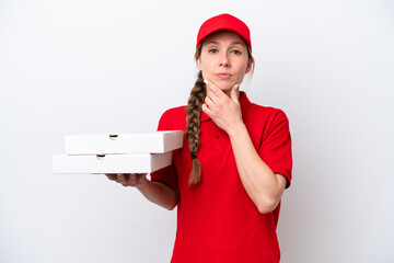 pizza delivery woman with work uniform picking up pizza boxes isolated on white background thinking