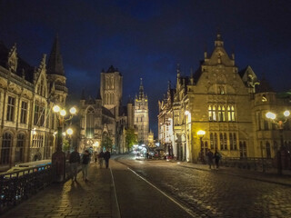 Medieval architecture of Ghent in Belgium illuminated in the evening