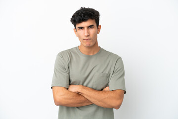 Obraz premium Young Argentinian man isolated on white background feeling upset
