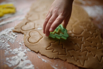Rolled dough for gingerbread Christmas trees, hearts