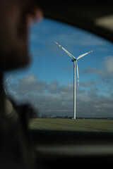 visible wind farms from the car window - environmental awareness