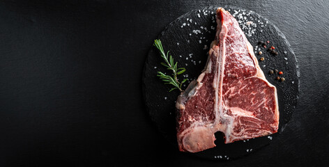 The T-bone or porterhouse steak of beef cut from the short loin. steak include T-shaped bone with...