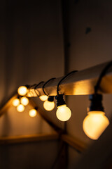 lights - garland - children's room - warm light on a wooden house