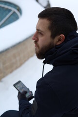 selective focus, a man with beard in winter outdoors