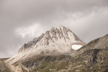 Mountain top in the clouds in the French Alps